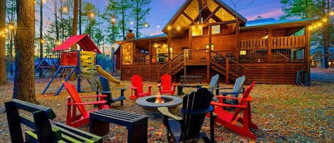 Gather 'round the fire pit and let the crackling flames ignite laughter, stories, and cherished moments shared with loved ones under the starry night sky.
