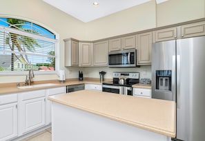 Bright and Open Kitchen with Modern Stainless Steel Appliances