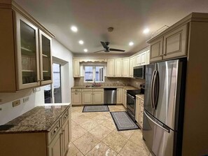 Kitchen with good appliances, Oven, Large fridge and Dishwasher