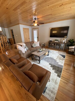 Open concept living room with lots of natural
Light.