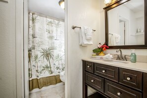 bathroom vanity with shower/tub