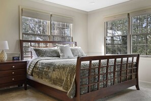 King bedroom on 2nd floor. The room also includes a couch, gas fire place and a queen bunk bed, as well as your own bathroom. This is a very large room.