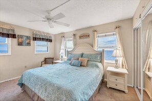 The master bedroom with a king bed has superb views of the Gulf of Mexico!
