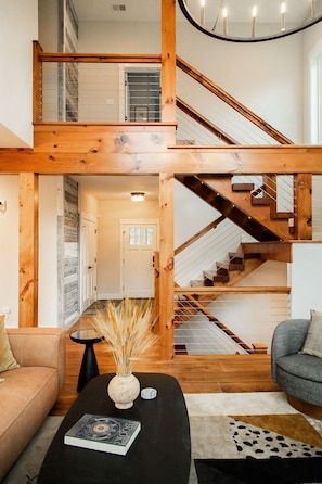 A closer look at the entryway and magnificent central staircase, a key feature of the home. 
