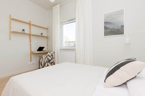 Comfortable double bed in the bedroom.