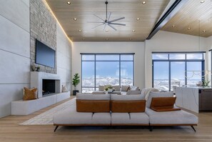Main floor family room with two custom Italian made sectionals. 