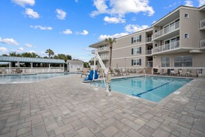 Two pools, with beach access, restroom, shower, gated entry