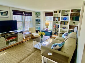 Light and bright living room with lots of seating areas for relaxing!