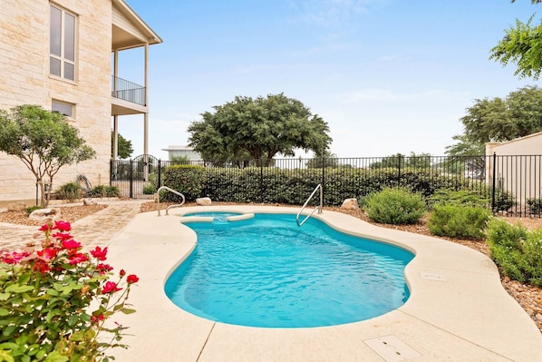 Beat the heat and make a splash in the shared pool at Gruene Silo Inn, the perfect way to cool off on a Texas summer afternoon.