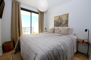 En-suite master bedroom with king size bed