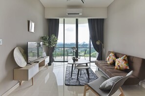 The stylish & comfy living area with a 50" Smart TV.
