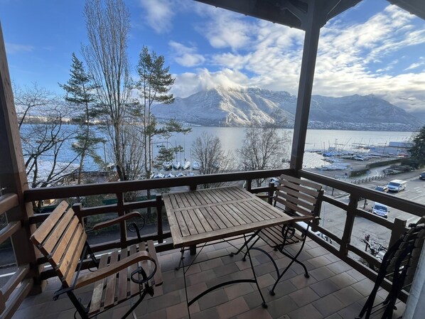 Balcony view to lake, mountains and marina