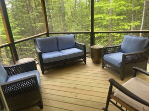 Screened porch comfortable Frontgate furniture, and fabulously enjoyable rocker