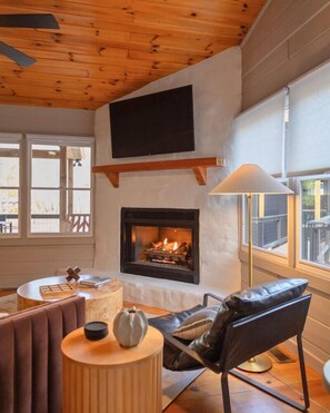 Our warm fireplace hearth – remote start fire, and a flat-screen LG smart TV