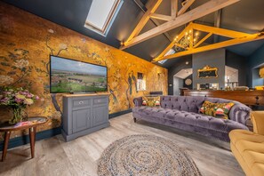 May Cottage, Titchwell: Comfortable seating in the living area, with billiards table