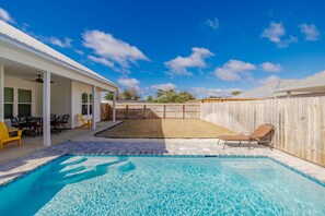 Spacious Fenced Yard with Lawn and Pool