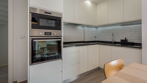 This bright and modern kitchenette will provide you will all the necessary amenities for a memorable and lovely stay #pt #portugal #loule #bright #modern #momerable #lovelystay