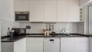 This bright and modern kitchenette will provide you will all the necessary amenities for a memorable and lovely stay #pt #portugal #loule #bright #modern #momerable #lovelystay