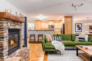 With two couches and kitchen stools, this space was designed for entertaining. 