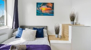 Comfortable double bed with chest of drawer storage