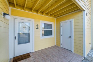 Front door entrance and laundry room door (with code) to the right