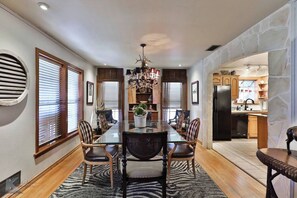 Seat up to 10 around this large dining table situated in the great room.