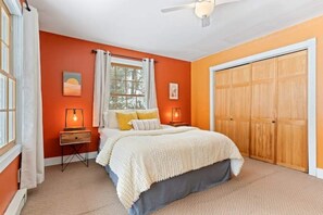 Light filled main level bedroom with large walk in closet