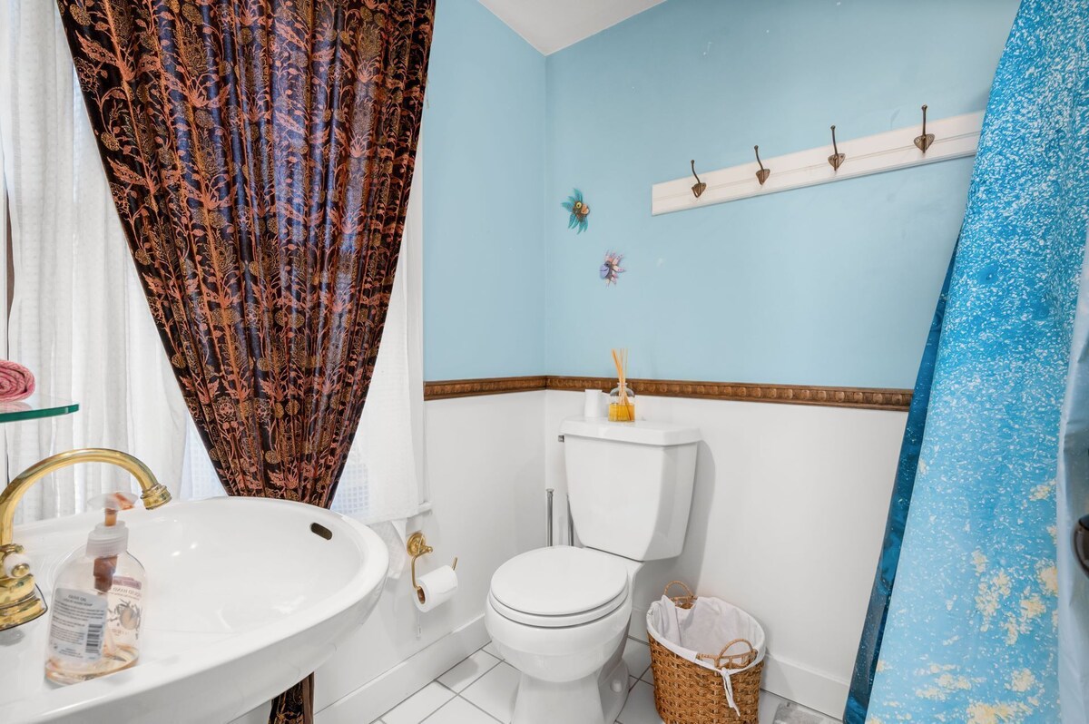 All the amenities of a vacation rental with colorful artwork, whimsical bedrooms and decor to match