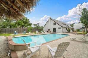 Embrace the elegance of this well-appointed and tranquil pool area