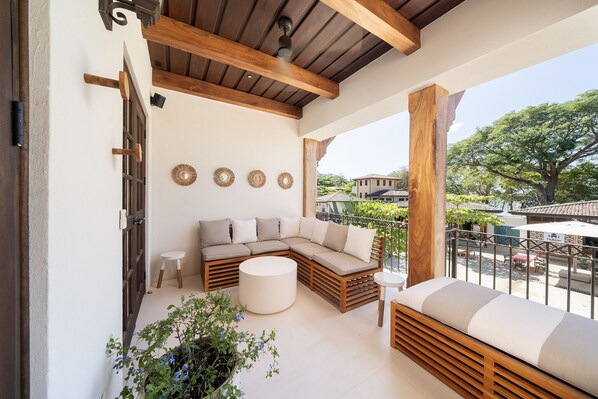 Spacious terrace with comfortable seating and gorgeous views