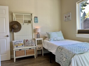 Two twin beds, nightstands, closet