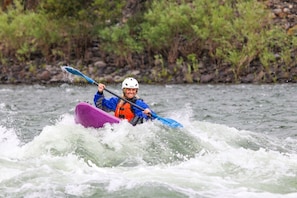 Area adventure kayaking in white water river