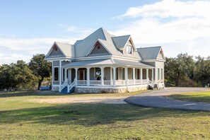 Immerse yourself in the natural beauty of our ranch as you admire the captivating views of our Victorian home nestled amidst acres of pristine countryside.