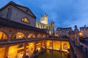 The Roman Bath and Bath Abbey at Night