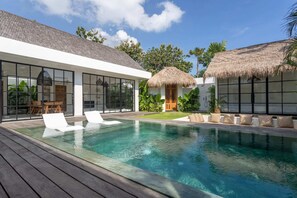 Outdoor area with a private pool