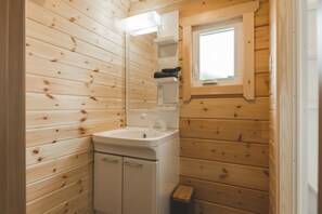 Washroom area equipped with hair dryer