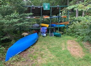 Canoe and kayak rack next to the dock.