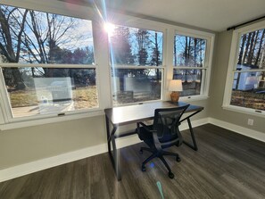 Office space with view of back yard
