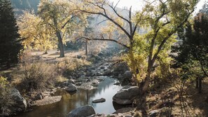 Enjoy crisp fall days along the river right on our property!