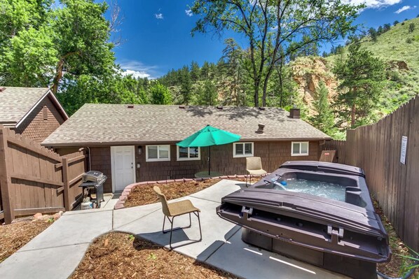 Enjoy a soak in your private hot tub after a long day of adventuring, taking in the mountain views or the night sky!