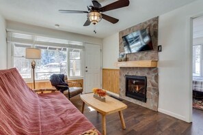 Your cozy living room complete with 42 inch Roku TV and gas fireplace