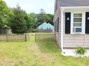 Guest home in rear (blue house)on separate lot. 
(Not included in rate)