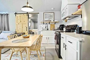 Gather around the table in a dining area where every meal feels like a special occasion.
