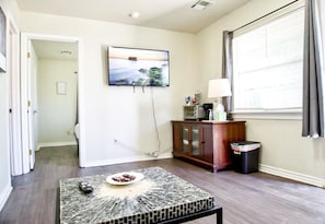 A stylishly designed living room where relaxation and sophistication coexist.
