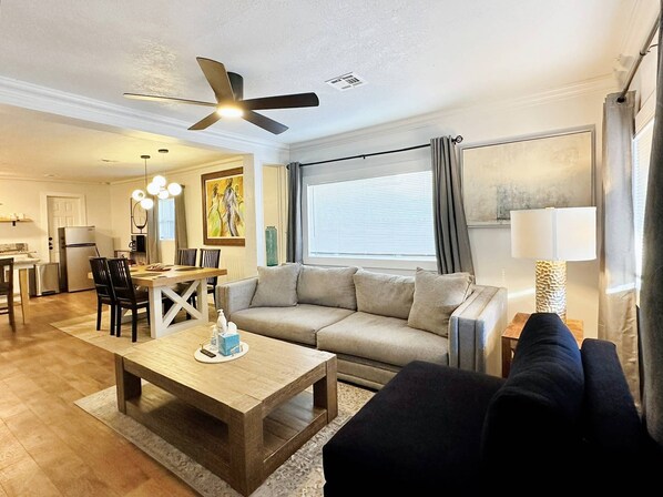 Bright and airy living room with large windows and stunning views.