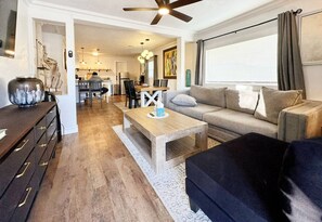 Unwind in a modern living room that offers a perfect blend of elegance and ease.