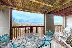 Relax and soak up the breathtaking view of the lake from the comfort of your outdoor seating area