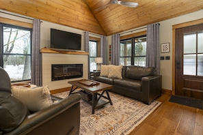 Living room with Tv and fireplace 