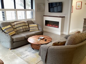 Seating and electric fire