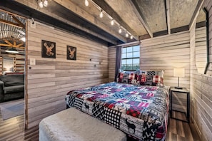 Beautifully designed bedroom located just off the living room.